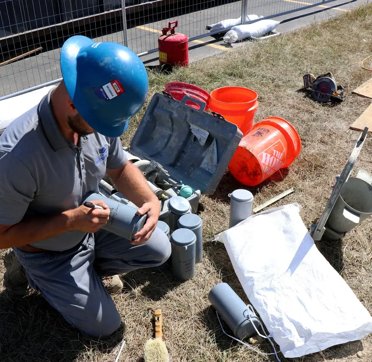CSA technician identifying field-cast concrete specimens